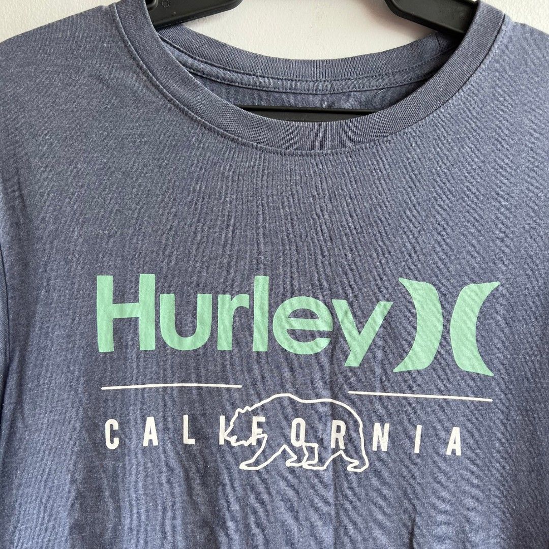 Hurley T Shirt top men's (Category: Tshirts & Polo Shirts ) located in Quezon City. Submitted by rosepam (Listing ID 1468195164, Image 3). Description: Hurley California Bear Graphic Shirt Size on tag: M *some pilling sa armpit FIX PRICE Measurements posted for reference.