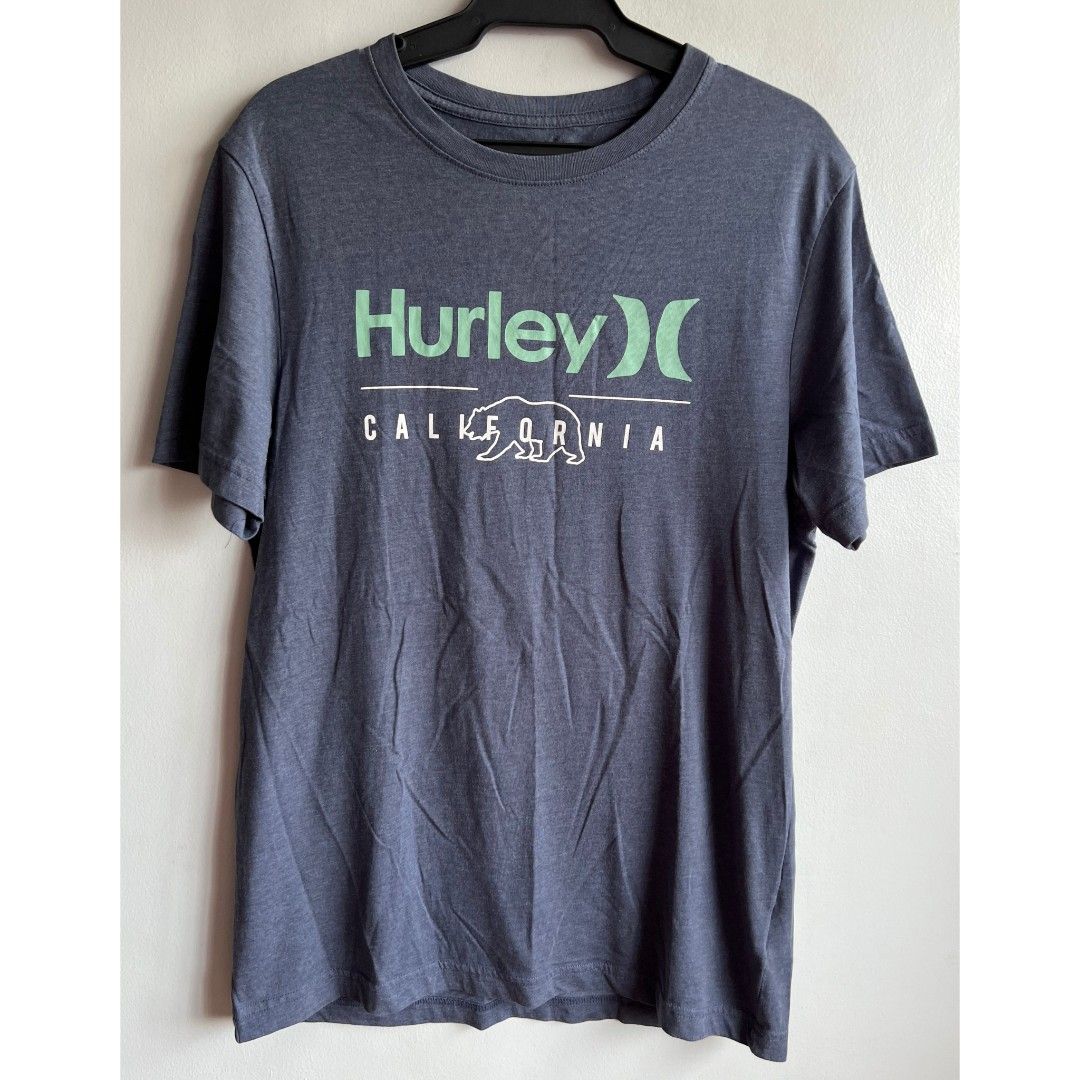 Hurley T Shirt top men's (Category: Tshirts & Polo Shirts ) located in Quezon City. Submitted by rosepam (Listing ID 1468195164, Image 2). Description: Hurley California Bear Graphic Shirt Size on tag: M *some pilling sa armpit FIX PRICE Measurements posted for reference.