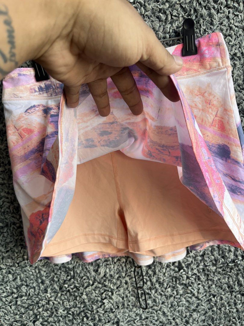 Ideology activewear skort. | Size XL (Category: Skirts) located in General Trias. Submitted by zrchustle.604 (Listing ID 1468281434, Image 3). Description: Ideology activewear skort. It features a colorful, multi-toned landscape print that resembles mountains at sunset, blending shades of pink, purple, orange, and white. Designed for athletic activities like tennis, golf, or running, it includes a wide comfort waistband and built-in liner shorts 