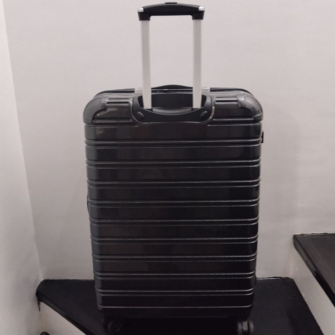 iFly Dark Grey Hard Shell Rolling Suitcase (Category: Luggage) located in Cavite. Submitted by msgs_2827 (Listing ID 1468113763, Image 2). Description: For Sale: iFly 28 inch Luggage Color: Dark Grey Condition: Only used once - in very good condition! Actual Measurements (including the wheels): Height: 29 inches Width: 20 inches Depth: 11 inches - Sleek dark grey carbon finish hardshell suitcase - Smooth-rolling spinner wheels for easy mobility -