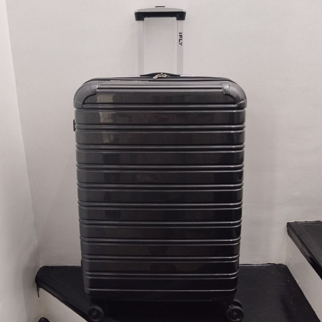 iFly Dark Grey Hard Shell Rolling Suitcase (Category: Luggage) located in Cavite. Submitted by msgs_2827 (Listing ID 1468113763, Image 1). Description: For Sale: iFly 28 inch Luggage Color: Dark Grey Condition: Only used once - in very good condition! Actual Measurements (including the wheels): Height: 29 inches Width: 20 inches Depth: 11 inches - Sleek dark grey carbon finish hardshell suitcase - Smooth-rolling spinner wheels for easy mobility -