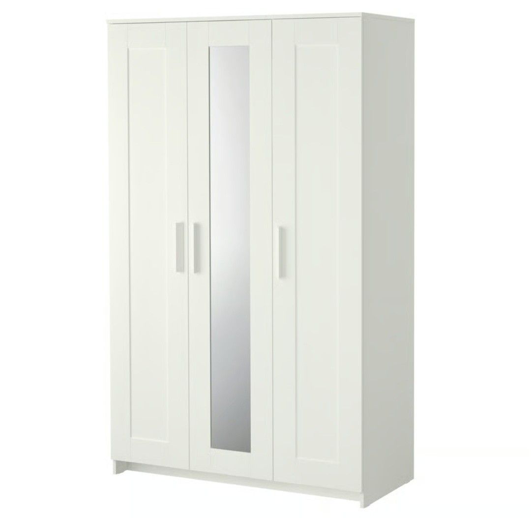 IKEA BRIMNES Wardrobe with 3 doors and mirror (Category: Shelves, Cabinets & Racks) located in Manila. Submitted by alyssa_gtrrz (Listing ID 1468258070, Image 2). Description: - Color & Design: Clean white finish with a modern, minimalist look - Features: 3 doors, central mirror panel, upper shelf storage, and spacious hanging area - Condition: Solid construction and well-maintained - Pick-up Note: Buyer must handle own disassembly and transport.