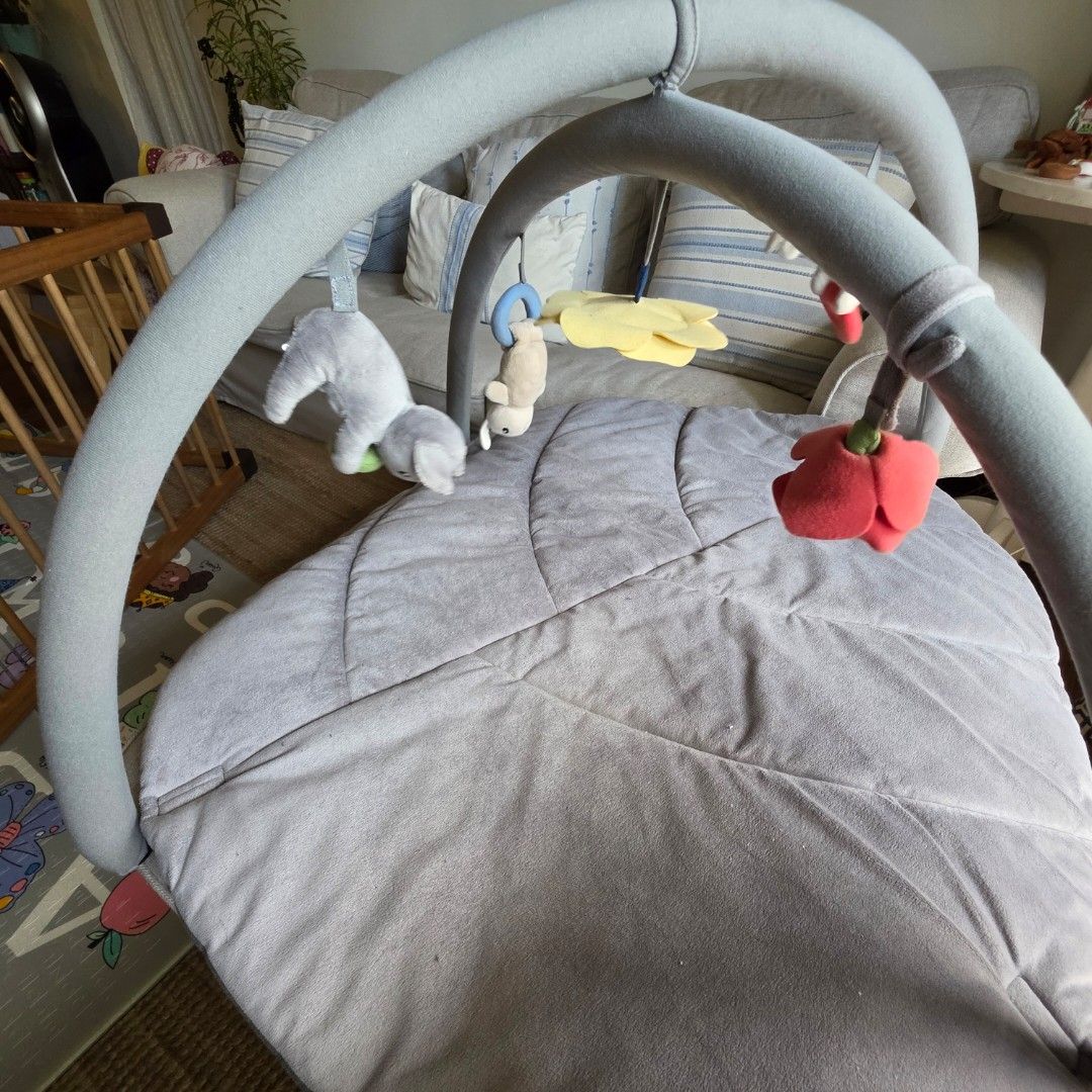 IKEA GULLIGAST Baby gym multicolor (Category: Infant Playtime) located in Manila. Submitted by my23686 (Listing ID 1468110824, Image 2). Description: - Multicolor baby gym featuring a soft, quilted grey mat - Includes sturdy arches with hanging plush toys (bunnies, flower, and rattle rings) - Great for tummy time and sensory development - Easy to assemble and dismantle - Machine washable for hassle-free cleaning.
