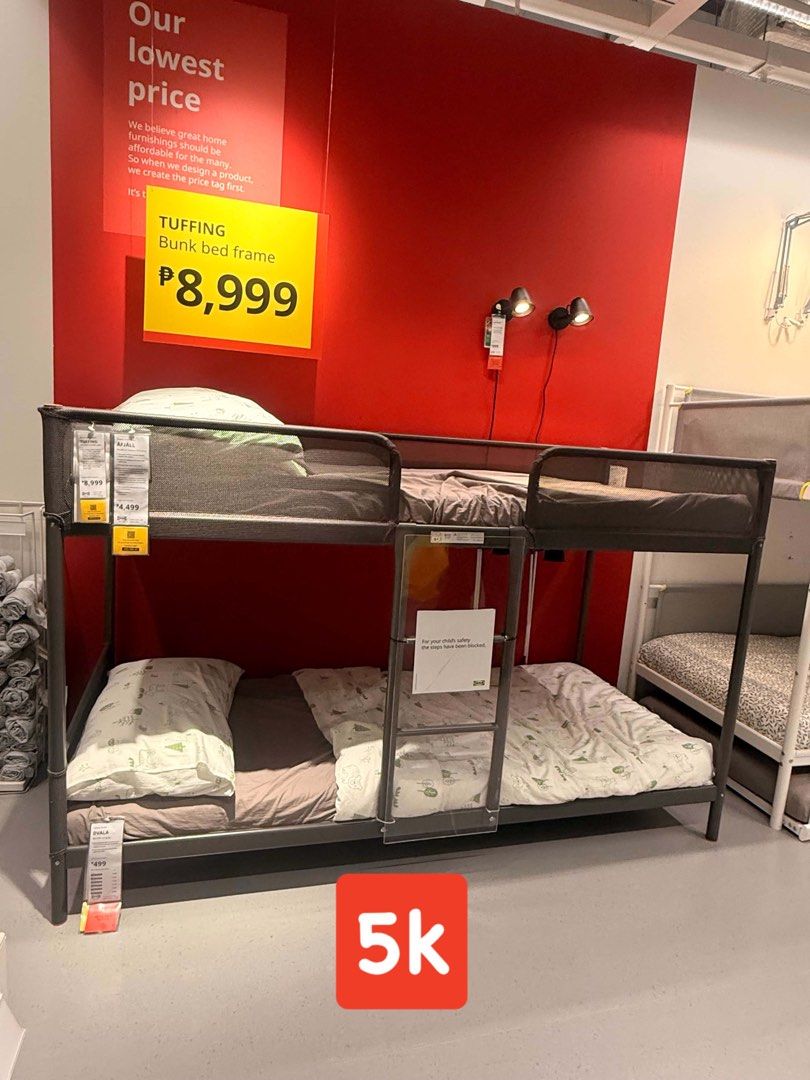 IKEA TUFFING Bunk Bed Frame (Category: Bed Frames & Mattresses) located in Paranaque City. Submitted by ivy_adea15 (Listing ID 1468259122, Image 1). Description: - Color & Material: Dark grey, sturdy metal frame - Size: Standard twin size (two-tier design) - Safety Features: Mesh side rails on top bunk & fixed middle ladder - Space Saver: Compact design ideal for kids or shared bedrooms - Convenience: Disassembles easily for transport.