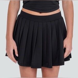 Indero Active Pleated Tennis Skort | Size M (Category: Skirts) located in General Trias. Submitted by zrchustle.604 (Listing ID 1468280362, Image 2). Description: Indero Active Pleated Tennis Skort in black. This style features a wide, flat waistband with an activewear logo circle at the center front/back, unstructured skater-style pleats, and built-in liner shorts underneath for secure coverage during movement..