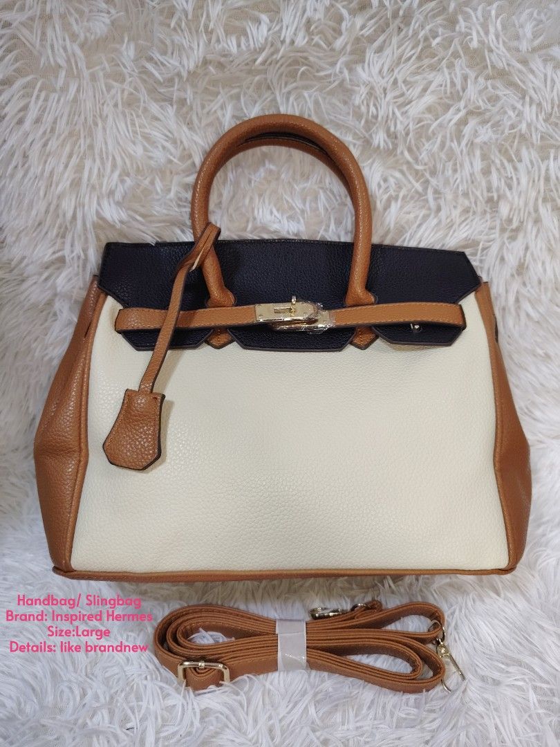 Large Tri-Color Handbag Slingbag (Category: Cross-body Bags) located in Quezon City. Submitted by zhelcloset01 (Listing ID 1468237271, Image 1). Description: Large tri-color handbag and sling bag. Black, beige, and brown color block design with gold-tone hardware. Double top handles and a detachable, adjustable brown shoulder strap included. Structured silhouette with twist-lock closure detail on the front flap. Clean textured faux leather materi