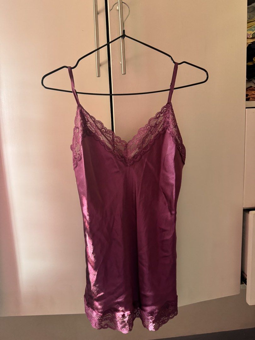 Intimissimi V-Neck Pyjama Top Bordeaux (Category: Undergarments & Loungewear) located in Rosales. Submitted by thriftingismygame (Listing ID 1468178462, Image 2). Description: - Brand: Intimissimi - Style: V-neck pyjama top / loungewear - Color: Rich bordeaux / deep plum with a soft sheen - Material: Silky fabric with delicate lace trim along the neckline and hem - Features: Adjustable spaghetti straps, brand tag intact - Condition: Great piece f
