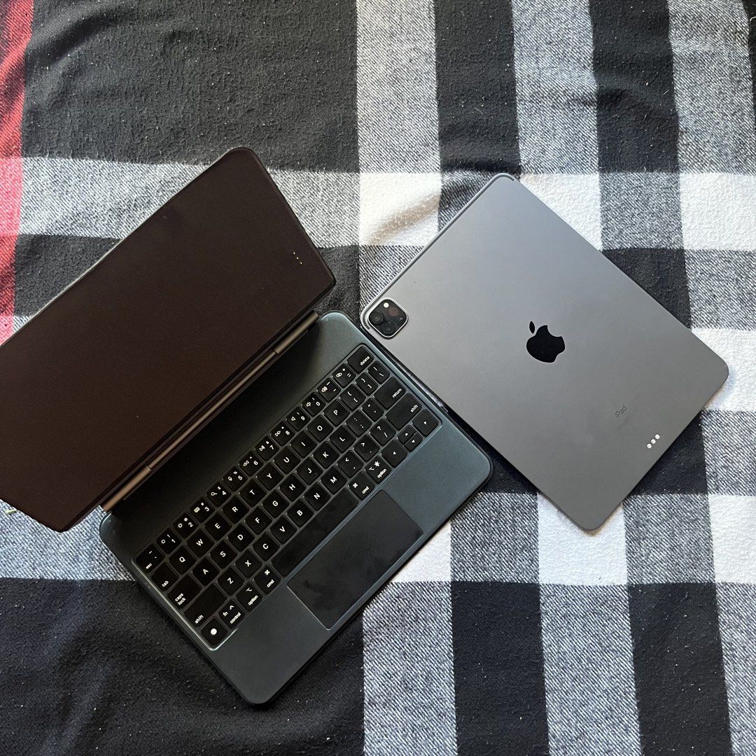 IPAD PRO M1 3RD GEN WITH MAGIC KEYBOARD!!(94%BH) (Category: iPad) located in Cabuyao City. Submitted by charlesghi34981 (Listing ID 1468079688, Image 2). Description: IPAD PRO M1 3RD GEN 128gb 11 inch wifi only 94% original battery health 120hz pro motion display No issue/all functions working Face is, true tone and etc working No history of repair/all parts original Good working condition(see pics) With 3utools result see last pic Inclusion: uni
