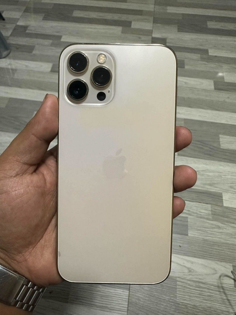 Iphone 12promax 128gb (Category: iPhone 12 Series) located in Manila. Submitted by motonog (Listing ID 1468078869, Image 2). Description: For sale or for swap sa lower ios add cash ka Iphone12promax 128gb Gold Unli reset Face id Truetone Any sim will do Us variant 78battery health (orig) No history of repair One scratch sa screen Dm sa mild issue Unit and case only Meet up only Manila location Pm sa price.