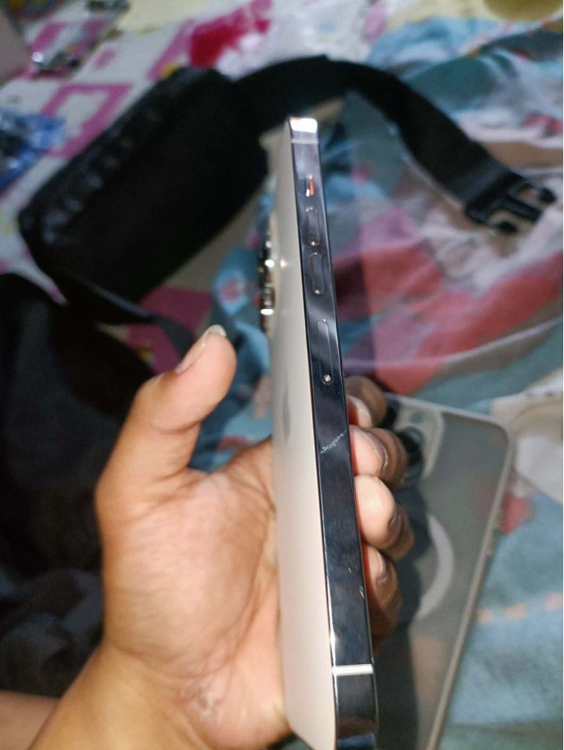 Iphone 13 pro max 128gb (Category: iPhone 13 Series) located in Manila. Submitted by brighthorse_edd334 (Listing ID 1468255445, Image 3). Description: Iphone 13 pro max b/a Localy puchased at powermac Pre order ko siya nakuha kaya ganyan yung country code 75% Bh (orig)pero napa kunat parin All orig Never repair Never open No issue Dents sign of usage Included Ugreen adopter and cable Orig box Cases Rfs:upgrade.