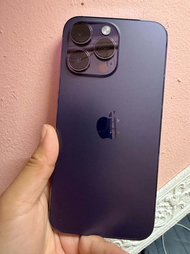 Iphone 14 Pro Max (Category: iPhone 14 Series) located in Manila. Submitted by asia.lee (Listing ID 1468107356, Image 1). Description: iPhone 14 Pro Max 128GB Deep Purple Personal used Openline / NTC replaced LCD + Batt (quality aftermarket, 1 month ago) Face ID working True Tone working Minor scratches Comes with original box + original cord 22K RFS: will upgrade meet up/ Manila.