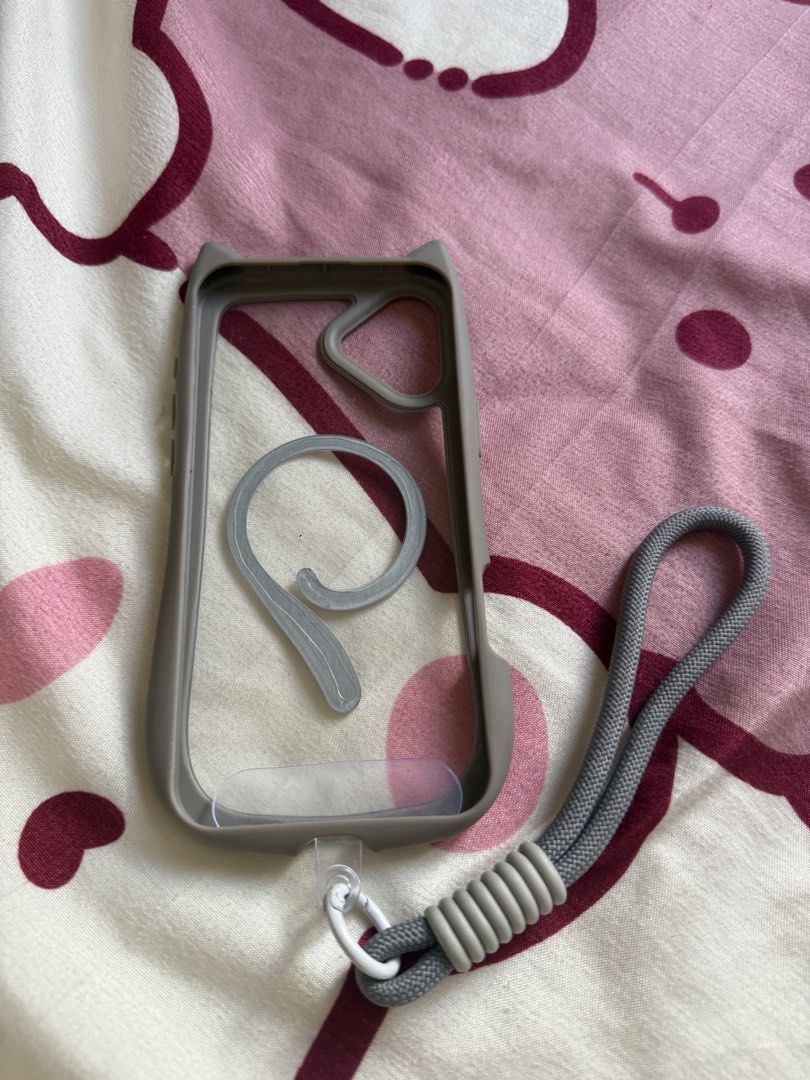 Iphone 16 plus (Category: Cases & Sleeves) located in Quezon City. Submitted by carpiorosa21379 (Listing ID 1468092387, Image 3). Description: Case black & Gray with phone charm cute cat ear magsafe.