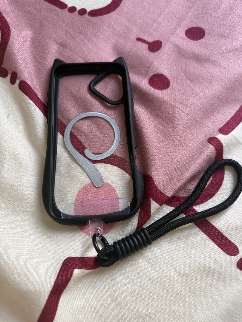 Iphone 16 plus (Category: Cases & Sleeves) located in Quezon City. Submitted by carpiorosa21379 (Listing ID 1468092387, Image 2). Description: Case black & Gray with phone charm cute cat ear magsafe.