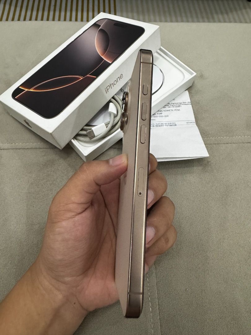 iPhone 16 Pro Max (Category: iPhone 16 Series) located in Guagua. Submitted by kewnewt (Listing ID 1468092673, Image 2). Description: iPhone 16 Pro Max 256gb Desert Titanium Factory Unlock (NTC Approved) Any SIM 98% Battery Health 210 CC only (as of now) Sobrang kinis Original Box Original Apple Cable Free Cases and WSKEN screen protector No issue as in fresh! No dent or scratches Bought brand-new with receipt (my name) Very good condition and hi