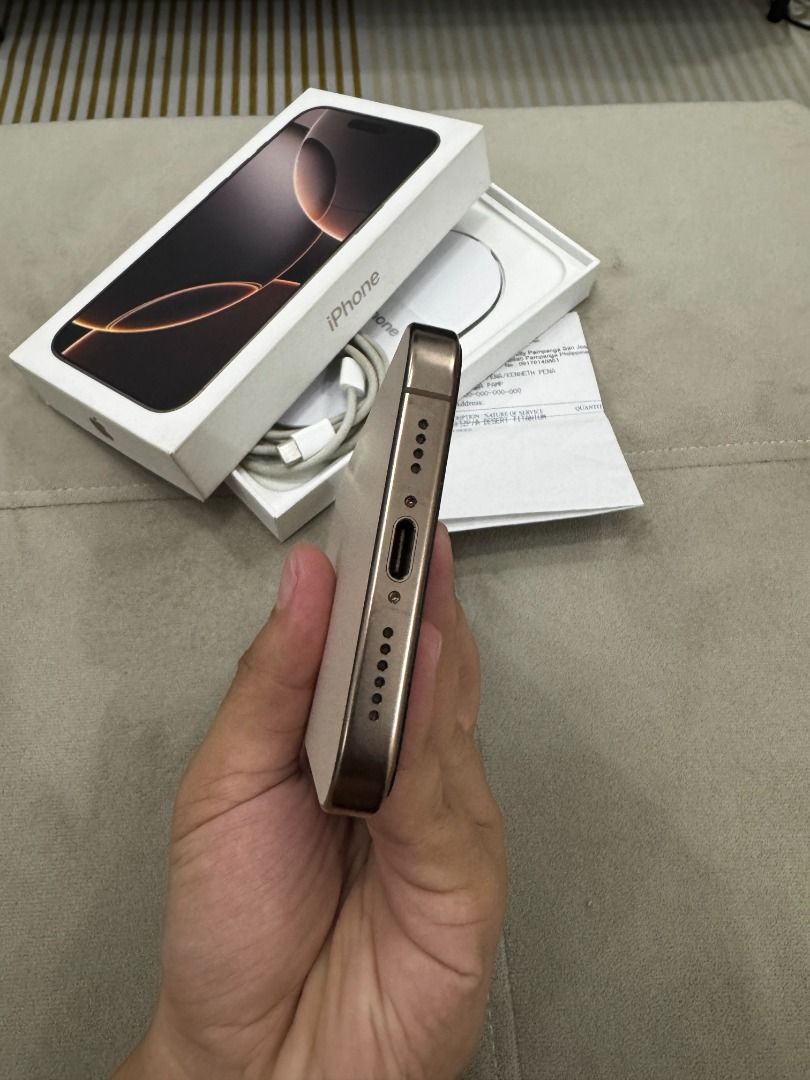 iPhone 16 Pro Max (Category: iPhone 16 Series) located in Guagua. Submitted by kewnewt (Listing ID 1468092673, Image 3). Description: iPhone 16 Pro Max 256gb Desert Titanium Factory Unlock (NTC Approved) Any SIM 98% Battery Health 210 CC only (as of now) Sobrang kinis Original Box Original Apple Cable Free Cases and WSKEN screen protector No issue as in fresh! No dent or scratches Bought brand-new with receipt (my name) Very good condition and hi