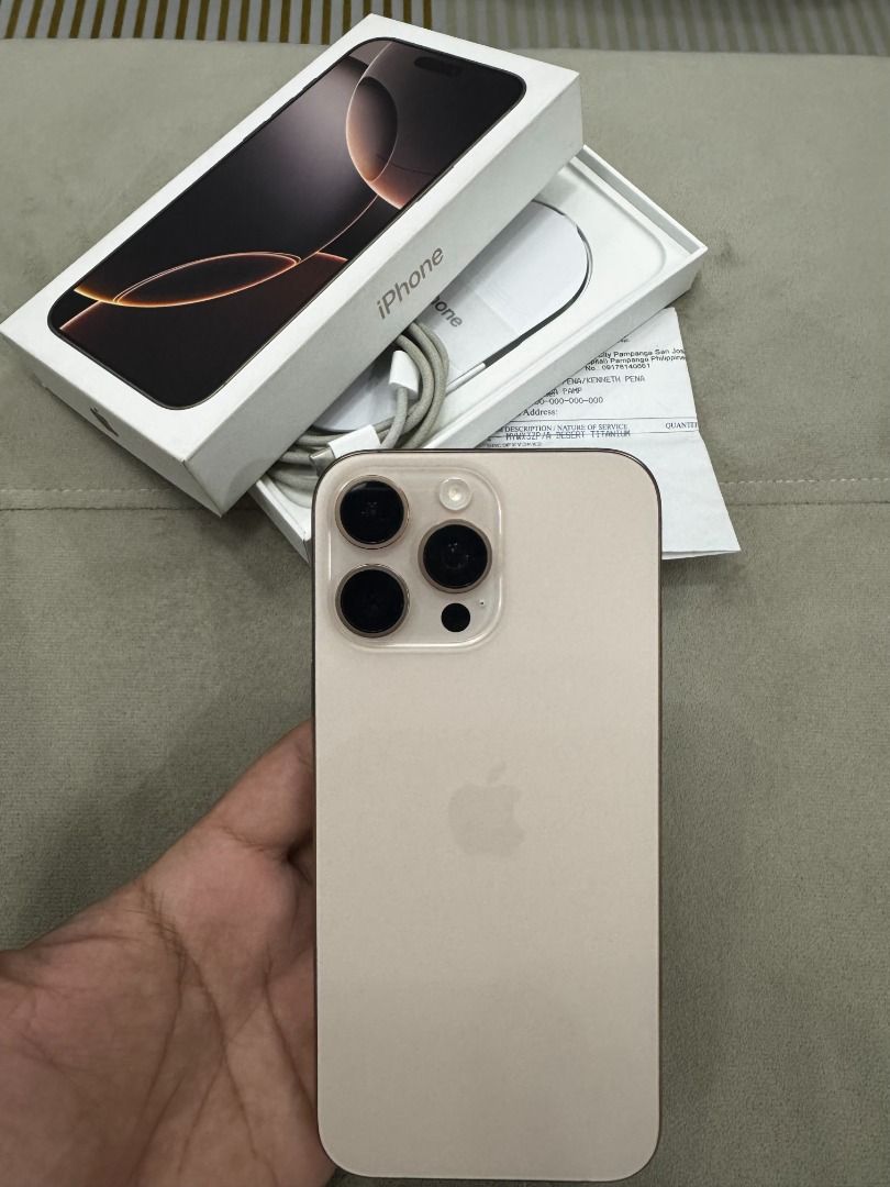 iPhone 16 Pro Max (Category: iPhone 16 Series) located in Guagua. Submitted by kewnewt (Listing ID 1468092673, Image 1). Description: iPhone 16 Pro Max 256gb Desert Titanium Factory Unlock (NTC Approved) Any SIM 98% Battery Health 210 CC only (as of now) Sobrang kinis Original Box Original Apple Cable Free Cases and WSKEN screen protector No issue as in fresh! No dent or scratches Bought brand-new with receipt (my name) Very good condition and hi