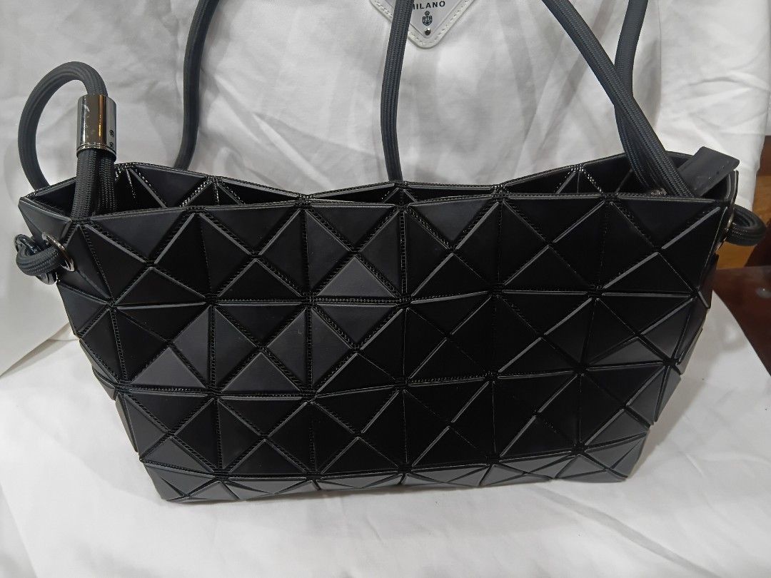 Issey Miyake (Category: Cross-body Bags) located in Subic. Submitted by AnythingBrandedby_May (Listing ID 1468122758, Image 1). Description: Issey Miyake.