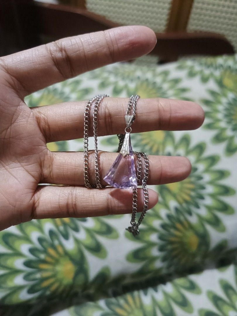 Bundled Japan Necklace With Pendant (Category: Necklaces) located in Cebu City. Submitted by elen30abalo (Listing ID 1468142268, Image 1). Description: - Stunning silver-tone curb chain necklace - Eye-catching faceted purple crystal pendant that catches the light - Secure metal bail holds the gemstone firmly in place - Convenient and simple clasp closure at the back - Versatile design, great for daily wear or gifting.
