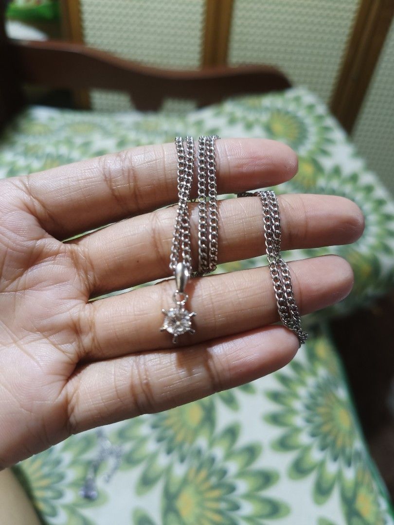 Bundled Japan Necklace With Pendant (Category: Necklaces) located in Cebu City. Submitted by elen30abalo (Listing ID 1468142268, Image 2). Description: - Stunning silver-tone curb chain necklace - Eye-catching faceted purple crystal pendant that catches the light - Secure metal bail holds the gemstone firmly in place - Convenient and simple clasp closure at the back - Versatile design, great for daily wear or gifting.