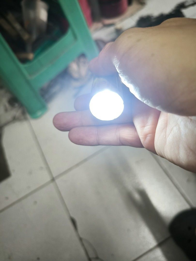 Japan surplus Compact LED Flashlight with Multi-Bulb Head (Category: Lighting) located in Angeles City. Submitted by yellowbrickstore (Listing ID 1468093812, Image 3). Description: - Type: Compact metal flashlight - Condition: Tested and 100% working, clean battery compartment - Lighting: 5 bright white LED bulbs - Design: Cylindrical body with yellow and silver Japanese-patterned tape - Best for: Camping, emergency kits, power outages, and dark 