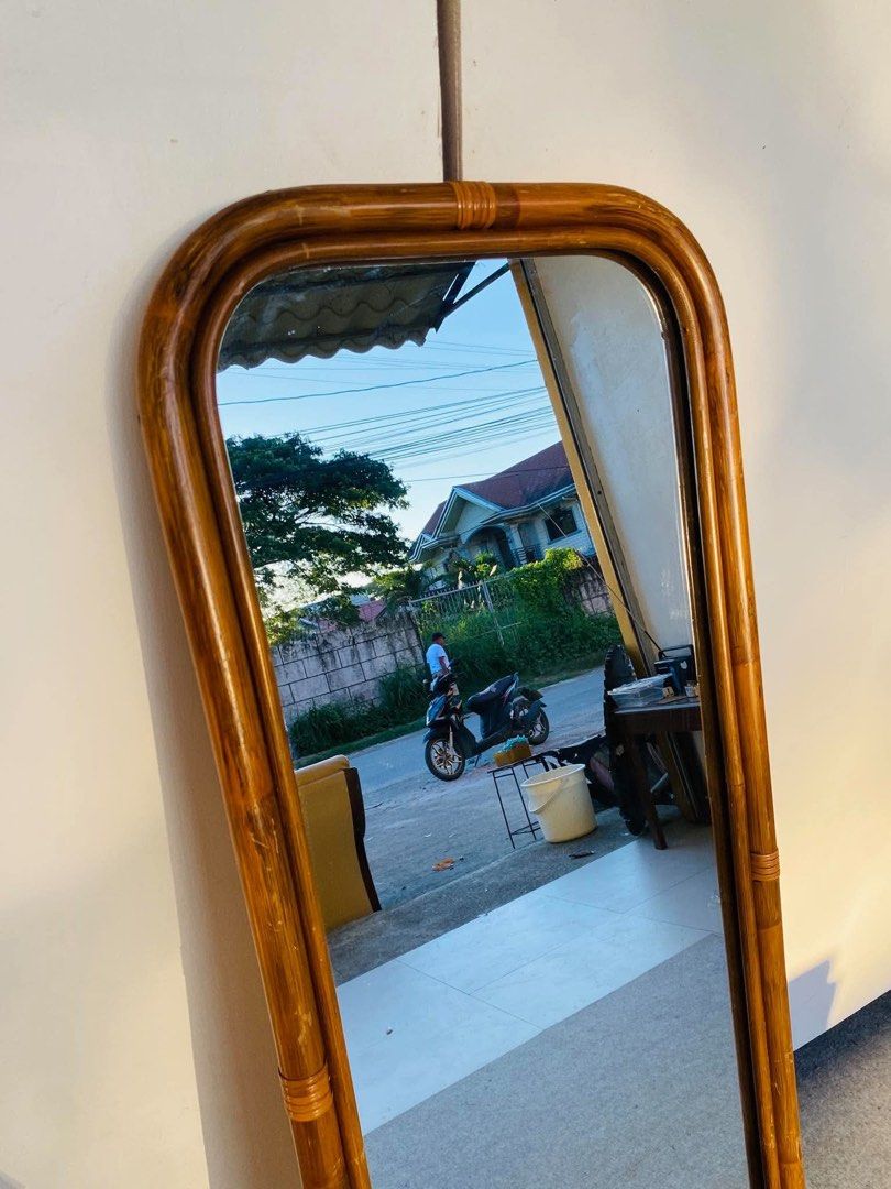 “JAPAN SURPLUS” RATTAN HANG MIRROR (Category: Mirrors) located in Bulacan. Submitted by monmon555 (Listing ID 1468261586, Image 2). Description: “JAPAN SURPLUS” RATTAN HANG MIRROR SIZE: 17L” x 53H” inches (AS-IS ITEM) IN GOOD CONDITION.