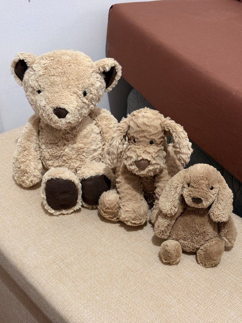 Jellycat bundle (Category: Plushies & Soft Toys) located in Tagaytay City. Submitted by denalycoco51 (Listing ID 1468227720, Image 1). Description: Please manage expectations before claiming! 💕 • NO REFUND / NO EXCHANGE — all sales are final. • ITEM CONDITION: Good as new, Only used for display. • Authenticity guaranteed, Retired Edward Bear (Medium) Fuddle wuddle dog (Medium) Bashful Toffee puppy (Small) • Please check all photos & descriptions