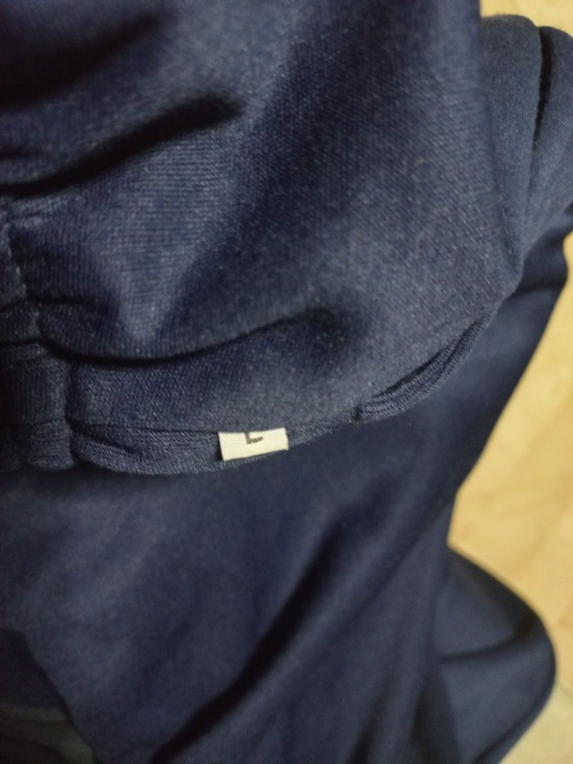 jogger PE (Category: Other Bottoms) located in Quezon City. Submitted by msdcshop (Listing ID 1468069892, Image 2). Description: - Color: Dark blue - Size: L (tag included) - Waistband: Elastic and secure - Material: Soft, very stretchy, and - lemgth is 38 inches -- comfortable - Style: Clean and simple design - Best for: Casual wear or lounging at home .