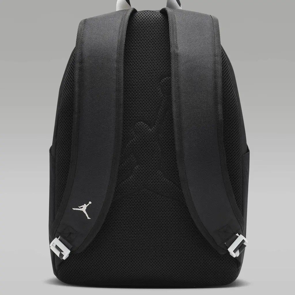 Jordan Black Backpack with White Arch Logo (Category: Backpacks) located in Mandaluyong City. Submitted by swiftbird_ed6c34 (Listing ID 1468100322, Image 3). Description: - Brand new with original store tags attached - Color: Classic black with white zipper pull accents - Design: Large arched Jordan text on the front and iconic Jumpman branding - Storage: Dual zippered front pockets for easy organization - Comfort: Padded mesh shoulder straps and