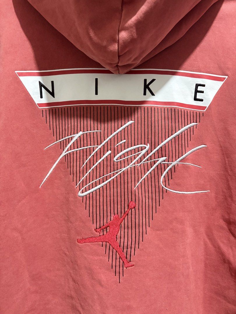 Jordan Flight Hoodie Acid Red (Category: Coats, Jackets and Outerwear) located in Santo Tomas. Submitted by miguelhussle (Listing ID 1468059661, Image 3). Description: - Brand: Jordan Flight - Color: Acid Red - Size: 3XL (Standard fit silhouette) -28 L x 25 W - Design: Large embroidered back graphic with Nike and Jumpman logo, plus a smaller stitched chest patch - Features: Front kangaroo pocket, ribbed cuffs and hem - Origin: Made in China.