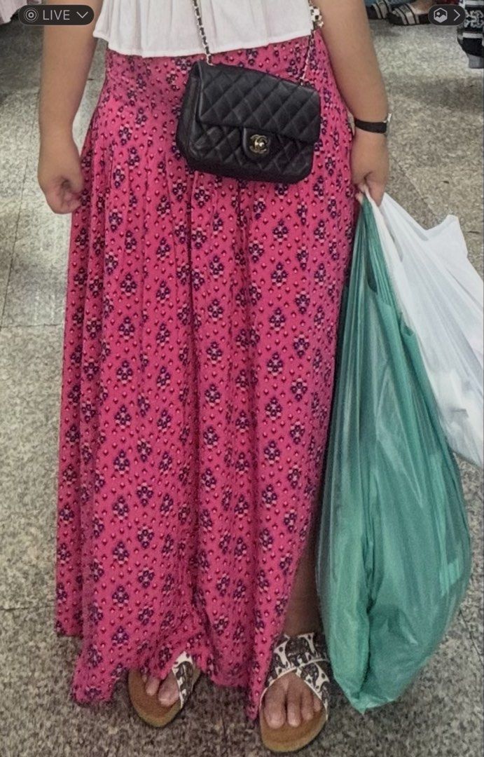 Juicy Couture Long Skirt (Category: Skirts) located in Manila. Submitted by theunniesshoppe (Listing ID 1468230821, Image 2). Description: From USA, around 178 USD. Used once during my trip to Thailand. With barely noticeable flaw on the slit, but cannot notice at all and can be repair easily. Price is still negotiable for serious buyers. Just need to declutter my clothes..
