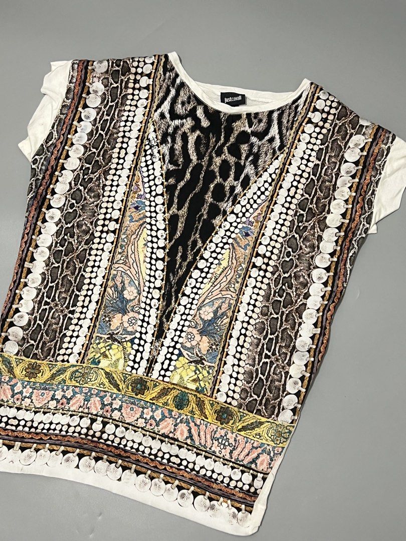 Just Cavalli -Animal Print Silk - (Category: Others Tops) located in Cavite. Submitted by asianluxe (Listing ID 1468175859, Image 3). Description: Just Cavalli Flat measurments! Length: 29 inches Armpit to armpit: 23 inches Shoulder to shoulder: 21.5 inches Hem:18 inches Guaranteed authentic Good condition Verypresentable .