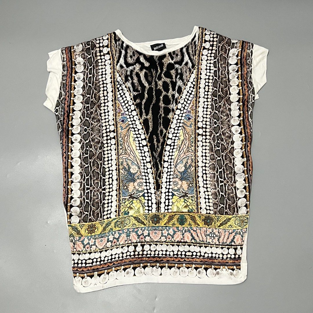 Just Cavalli -Animal Print Silk - (Category: Others Tops) located in Cavite. Submitted by asianluxe (Listing ID 1468175859, Image 1). Description: Just Cavalli Flat measurments! Length: 29 inches Armpit to armpit: 23 inches Shoulder to shoulder: 21.5 inches Hem:18 inches Guaranteed authentic Good condition Verypresentable .