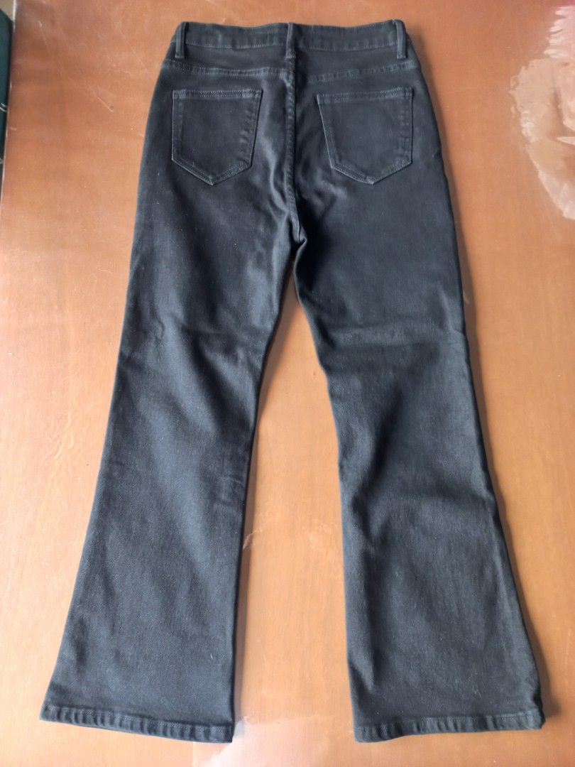 Kamiseta Black Flare Jeans Size M (Category: Jeans) located in Cainta. Submitted by jacypluto_shop (Listing ID 1468155387, Image 2). Description: - Brand: Kamiseta - Size: Medium (tag attached) - Color/Wash: Solid dark wash black - Style: Flared cut leg - Features: Classic button closure, front and back pockets - Condition: Brand new with tags.