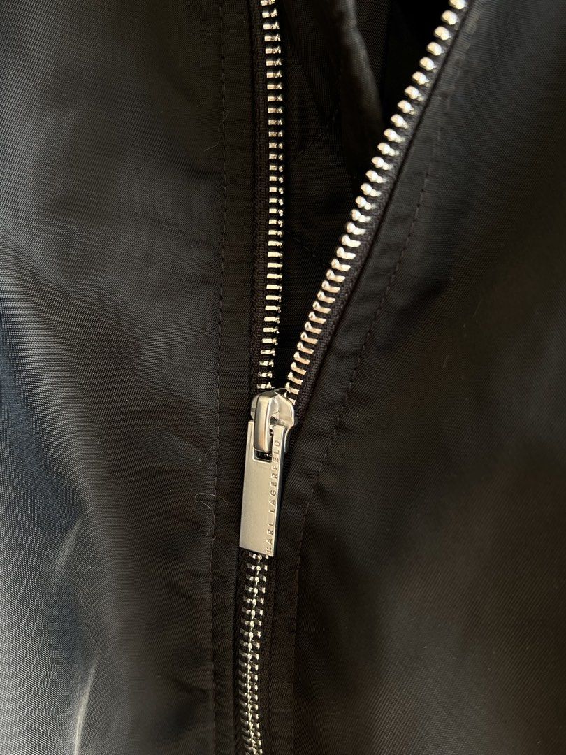 KARL LAGERFIELD - MA- 1 BOMBER JACKET (Category: Coats, Jackets and Outerwear) located in Bacolod City. Submitted by timelessbyjosh (Listing ID 1468169808, Image 3). Description: BEST FOR CASUAL OUTFITS SIZE : 55 ACTUAL COLOR : BLACK COLOR RATE : 10 OUT OF 10 CONDITION : NEAR NEW MATERIAL : 98 % NYLON & 2 % POLYURETHANE MADE IN : FLAWS : NONE DIMENSIONS LENGTH - WIDTH ( ARMPIT TO ARMPIT ) - SHOULDER TO SHOULDER - SLEEVE LENGTH ( ARMPIT TO WRIST )