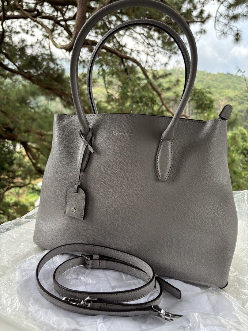 KATE SPADE Caravan Satchel (Category: Cross-body Bags) located in Baguio. Submitted by thecuratedcartbymj (Listing ID 1468253643, Image 1). Description: PRE-LOVED | Authentic KATE SPADE Caravan Satchel Color: Gray Condition: Preloved / Used Includes detachable shoulder strap ⚠️ Condition: Preloved. May visible signs of wear on some parts, including the handles and leather trim. Please check all photos carefully for the actual condition. 📩 Send u