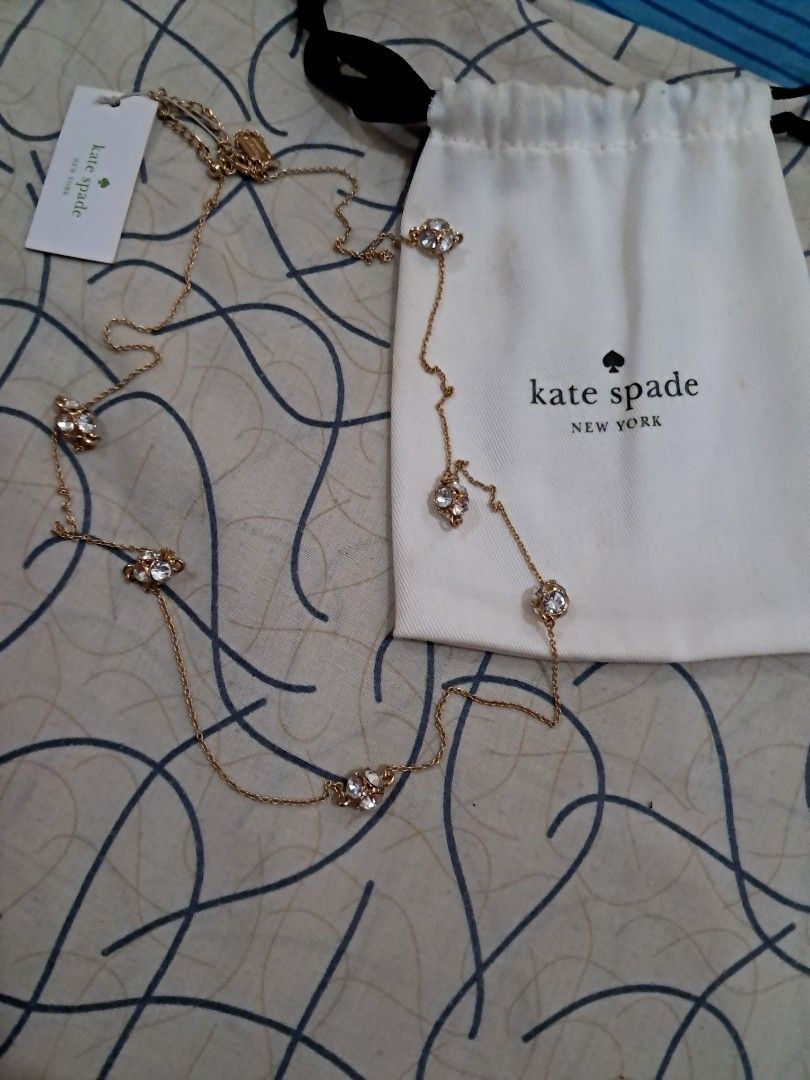 Kate Spade necklace (Category: Necklaces) located in Las Pinas. Submitted by shop2ship (Listing ID 1468103734, Image 2). Description: Kate Spade Lady Marmalade necklace clear/gold. This collection has six stones. Length is 30" plus adjustable chain. Can be worn doubled around the neck. Excellent vintage condition. Not use still with tag on it..