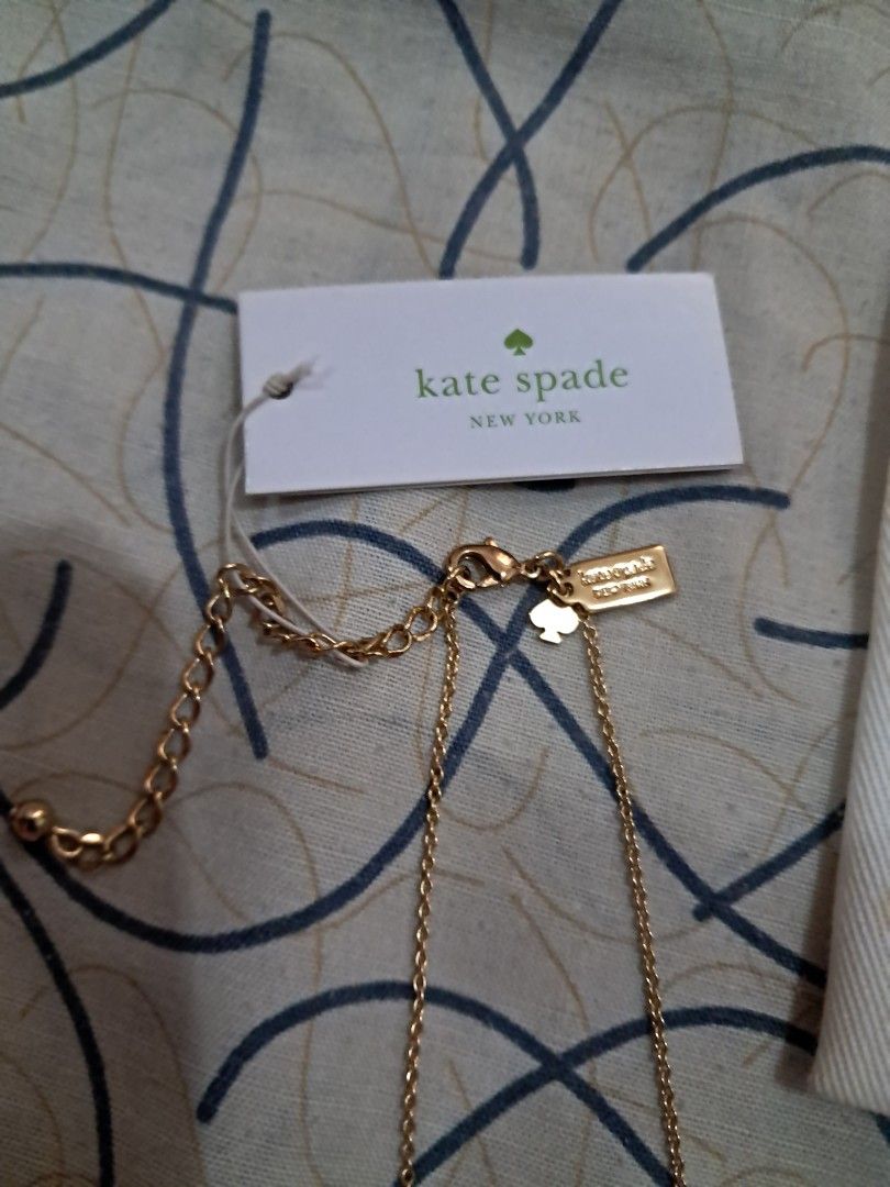 Kate Spade necklace (Category: Necklaces) located in Las Pinas. Submitted by shop2ship (Listing ID 1468103734, Image 3). Description: Kate Spade Lady Marmalade necklace clear/gold. This collection has six stones. Length is 30" plus adjustable chain. Can be worn doubled around the neck. Excellent vintage condition. Not use still with tag on it..