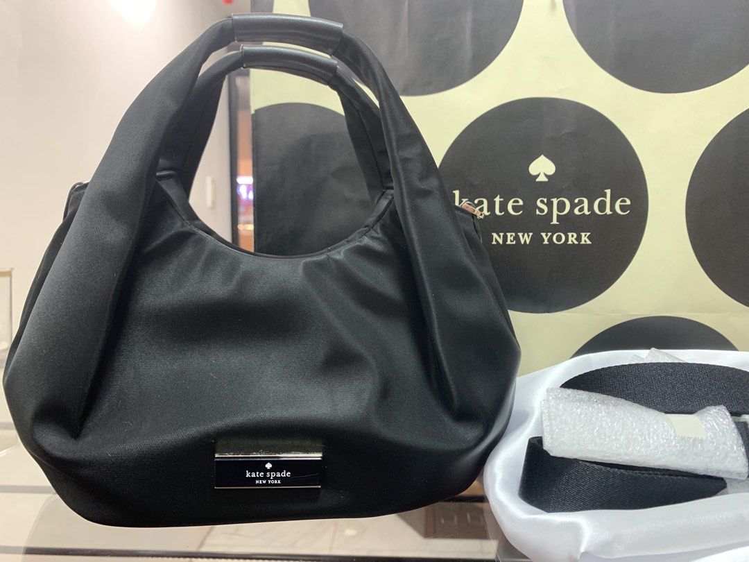 Kate Spade Orignal two way bag (Category: Cross-body Bags) located in Quezon City. Submitted by dazzlejeweller (Listing ID 1468080099, Image 2). Description: Original Kate spade two way bag, you can use as hand bag or cross body bag! Brand new ! Can ship via lalamove or meet up here in Araneta center Cubao or visit our shop . Message now! .