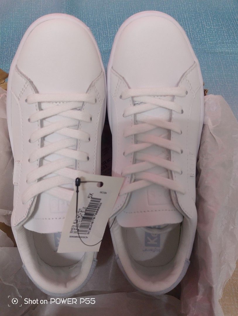 Keds Ace Leather White Light Blue Sneakers (Category: Sneakers) located in Binan City. Submitted by stuffshop29 (Listing ID 1468093776, Image 3). Description: - Brand: Keds Ace Leather - Color: White with light blue accents - Size: UK 3 M / EUR 35.5 M / 5X - Condition: Brand new with tags attached, in original box - Style: Classic lace-up casual sneakers.