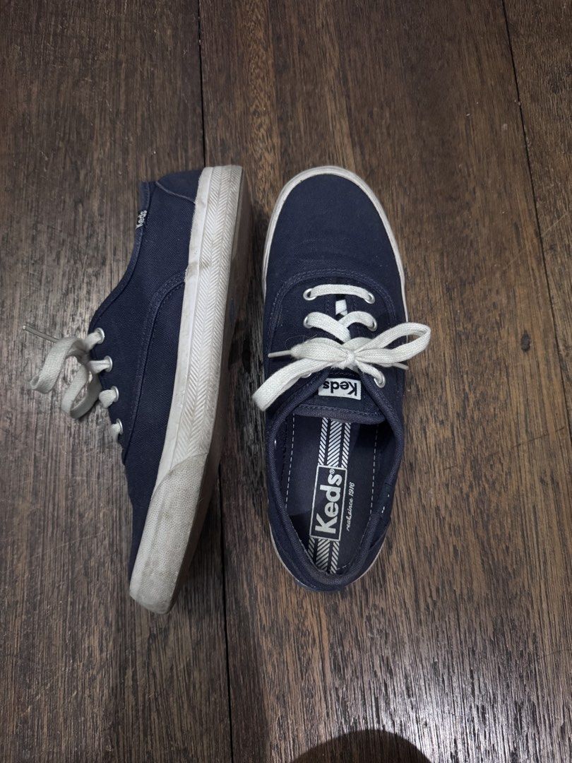 Keds Navy Blue Canvas Sneakers US 8 (Category: Sneakers) located in Manila. Submitted by lisa.ono (Listing ID 1468143234, Image 2). Description: - Brand: Keds - Color: Navy Blue - Size: US 8 / UK 5.5 / EUR 39 - Style: Classic low-top canvas sneakers with white laces and rubber soles - Condition: Worn a few times; fabric is in solid shape with no tears or major stains, soles have minor dirt from normal outdoor wear.