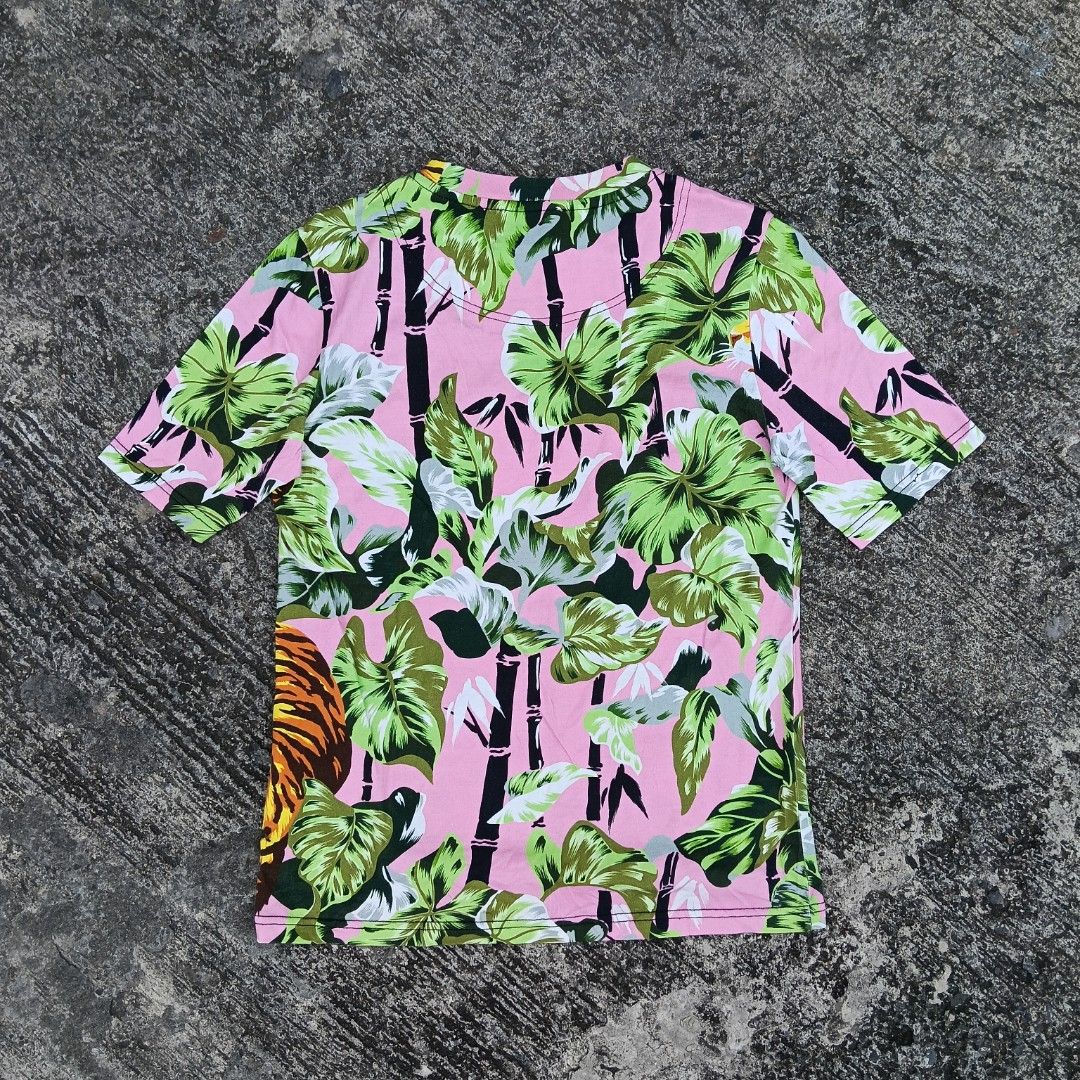 Kenzo "Bamboo" Tiger T-shirt (Category: Shirts) located in Lucena. Submitted by gaaaaarments.phv3 (Listing ID 1468098873, Image 2). Description: Kenzo "Bamboo" Tiger T-shirt Verygood Condition Flaw / Issue : None Xs on tag 17 Width / 23.5 Length 1,499 + Shipping Fee.
