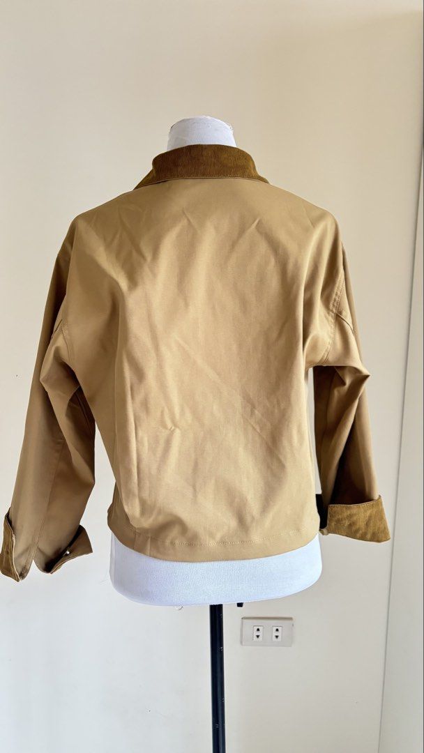 Khaki Corduroy Collar Zip-Up Utility Jacket (Category: Coats, Jackets and Outerwear) located in Baguio. Submitted by zenforest.fd186d (Listing ID 1468222679, Image 3). Description: - Color & Style: Khaki utility jacket with contrast brown corduroy collar and cuffs - Closure: Full zip front closure - Pockets: Two front chest pockets with metallic snap buttons - Fit: Trendy cropped, boxy fit - Fabric: Single-layer design, perfect for autumn and win