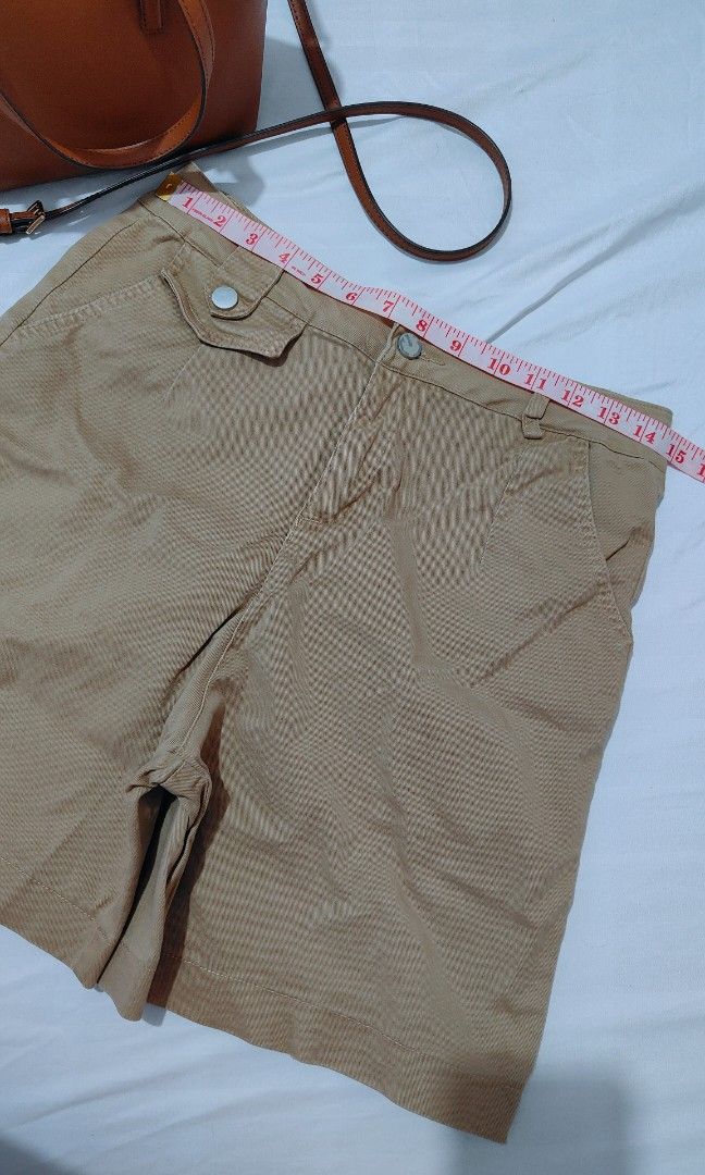 Khaki Shorts High Waisted Utility Pockets (Category: Shorts) located in Bacolor. Submitted by annjjjjj (Listing ID 1468084830, Image 2). Description: - Color: Khaki / Neutral brown - Material: Sturdy, durable cotton - Features: Functional front pockets, belt loops, smooth zipper fly with button closure - Fit: Mid-length style - Condition: Great for casual everyday wear and easy to match with basic tops.