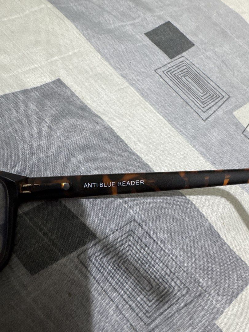 Kinetix Anti Blue Reading Glasses +1.50 (Category: Sunglasses & Eyewear) located in Quezon City. Submitted by big_fat_momma (Listing ID 1468068706, Image 3). Description: - Brand/Model: Kinetix P-Alive-2 - Frame: Classic rectangular leopard design - Lenses: Blue light blocking for screen work - Strength: +1.50 magnification - Condition: Clean, lightweight, and ready to wear RFS: nag iba n ng grado mata ko.