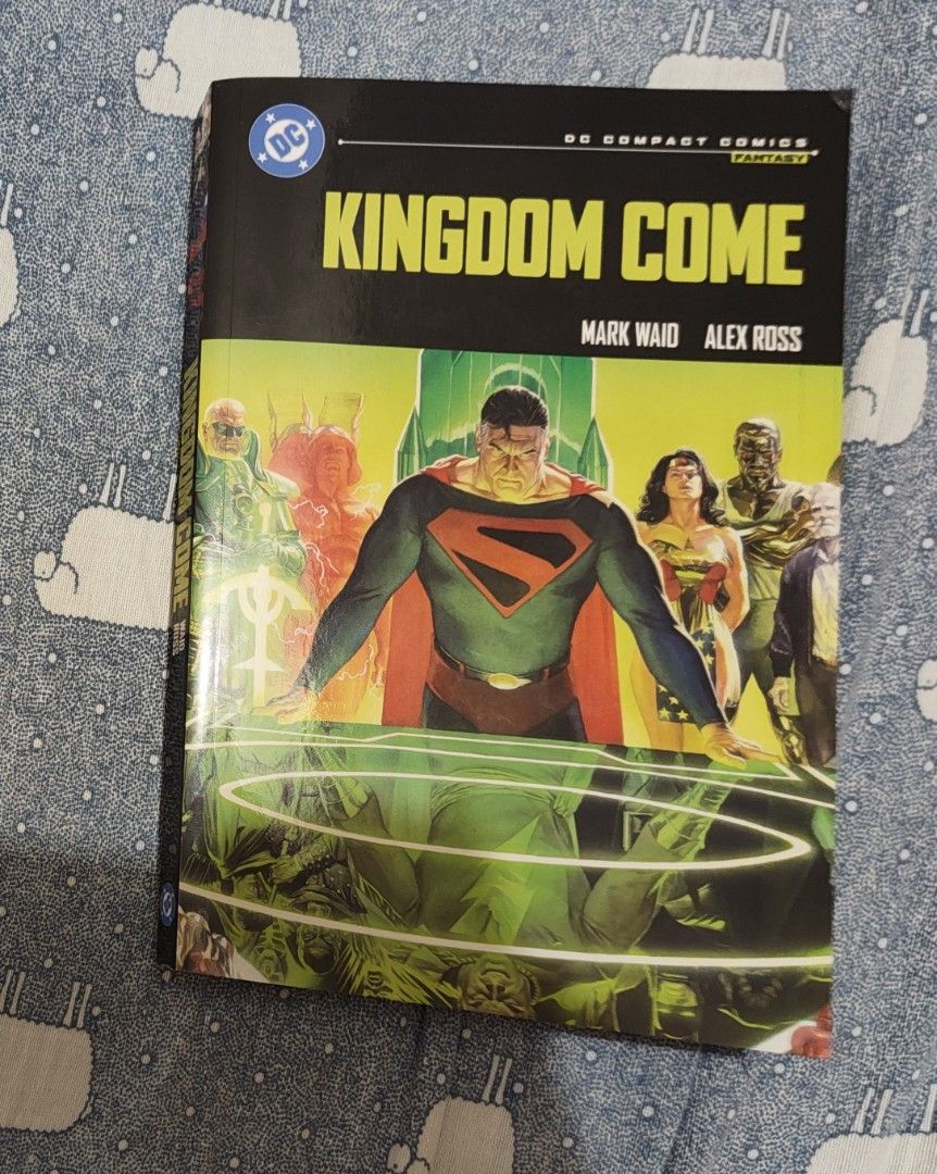 Kingdom Come DC Compact Comics Mark Waid Alex Ross (Category: Comics & Manga) located in Las Pinas. Submitted by adrianmercygun19 (Listing ID 1468226811, Image 1). Description: - Title: Kingdom Come graphic novel by Mark Waid & Alex Ross - Publisher: DC Compact Comics line - Format: Paperback edition with iconic artwork - Condition: Read once, stored carefully on a shelf - Pages: Clean, intact, with zero tears or markings.