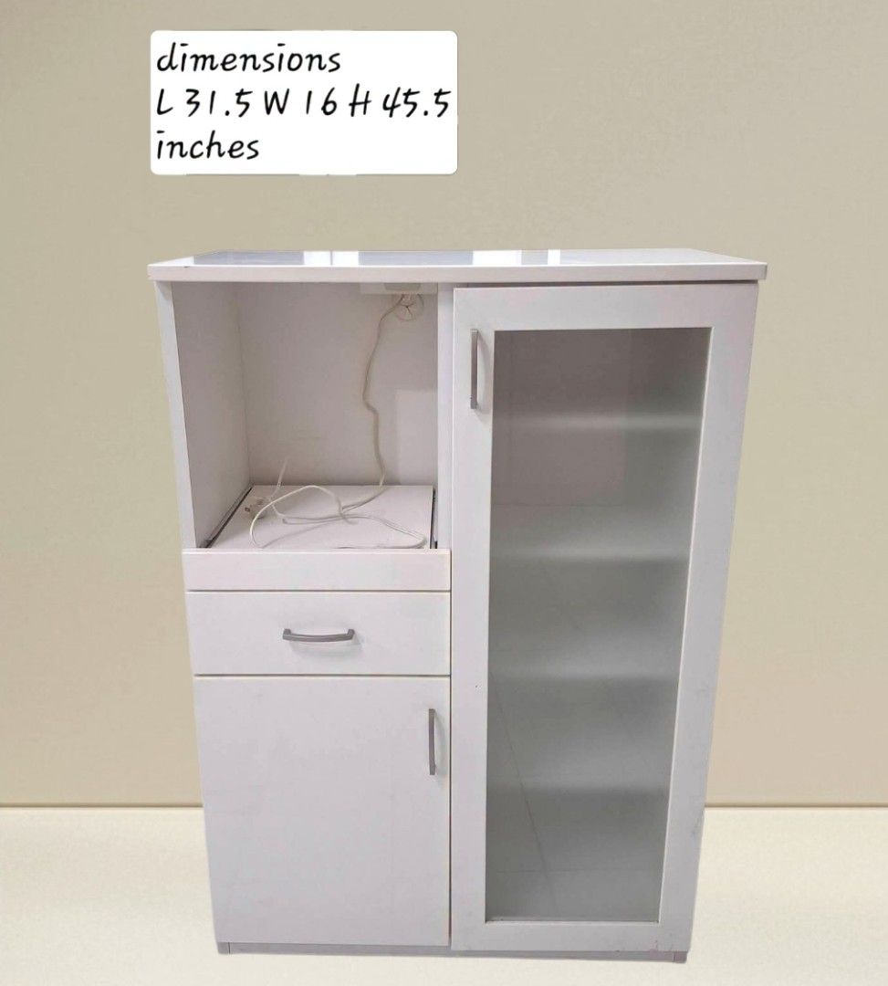 Kitchen Counter Buffet Sideboard Cabinet Coffee Nook (Category: Shelves, Cabinets & Racks) located in Quezon City. Submitted by dannikkishoppe2 (Listing ID 1468283265, Image 1). Description: Kitchen Counter Buffet Sideboard Cabinet Coffee Nook ‼️₱7500‼️ *mdf, solid wood, plyboard, frosted glass doors *adjustable shelves *with pullout shelf and built-in outlet for microwave, rice cooker, or other appliances • in good condition Please manage your e