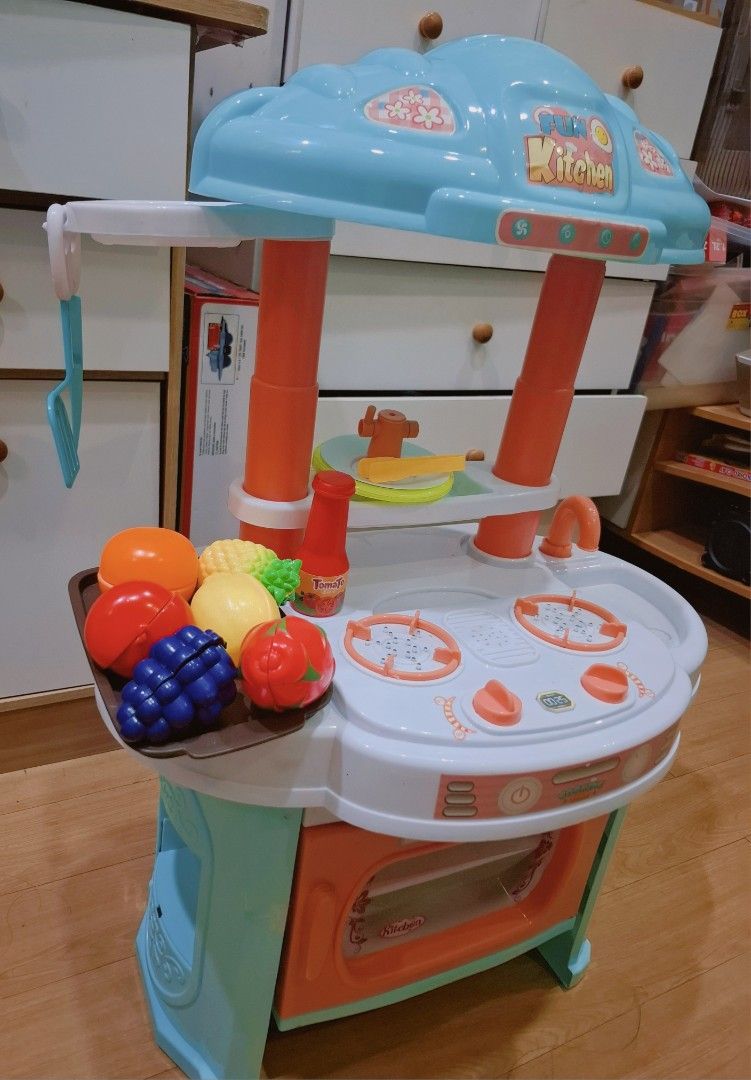 Kitchen Pretend Play Toy Set with Lights & Sounds (Includes Accessories) (Category: Kids Toys) located in Manila. Submitted by shanfern1412 (Listing ID 1468071773, Image 2). Description: Features & Details: ​Interactive Stove: Burner features working lights & cooking sounds ​Power Requirement: Battery operated (requires 3 x AA batteries—not included) ​Includes Accessories: ​Assorted play fruits & vegetables (grapes, orange, lemon, tomato, etc.) ​