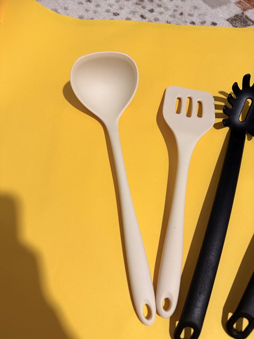 Kitchen Utensils Set Spatula Ladle Pasta Server (Category: Cookware & Accessories) located in Mandaluyong City. Submitted by riz_040521 (Listing ID 1468076392, Image 2). Description: - 4-piece essential kitchen utensil set - Set includes: 2 cream pieces (slotted turner, ladle) and 2 black pieces (pasta server, ladle) - Heat-resistant material for safe daily cooking - Convenient hang holes on each handle for easy storage - Easy to clean and ready 