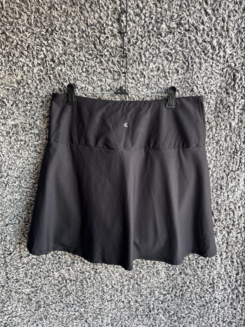 Kyodan Athletic Tennis Skort | Size L (Category: Skirts) located in General Trias. Submitted by zrchustle.604 (Listing ID 1468280582, Image 1). Description: skort (a skirt with built-in shorts) from the activewear brand Kyodan. This specific garment features their signature geometric "K" logo centered on the back waistband. Founded in Montreal, Canada, Kyodan focuses on affordable, functional athleisure and activewear designed for activities like