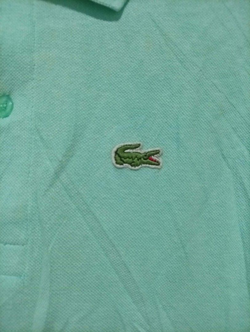 Lacoste mens Polo Shirt ( Authentic ) (Category: Tshirts & Polo Shirts ) located in Barotac Nuevo. Submitted by john.pritz (Listing ID 1468142983, Image 2). Description: Lacoste Mens Polo Shirt Like new condi issue cut neck tag but ( Authentic ) Size 5 on tag Width 22 Length 28.